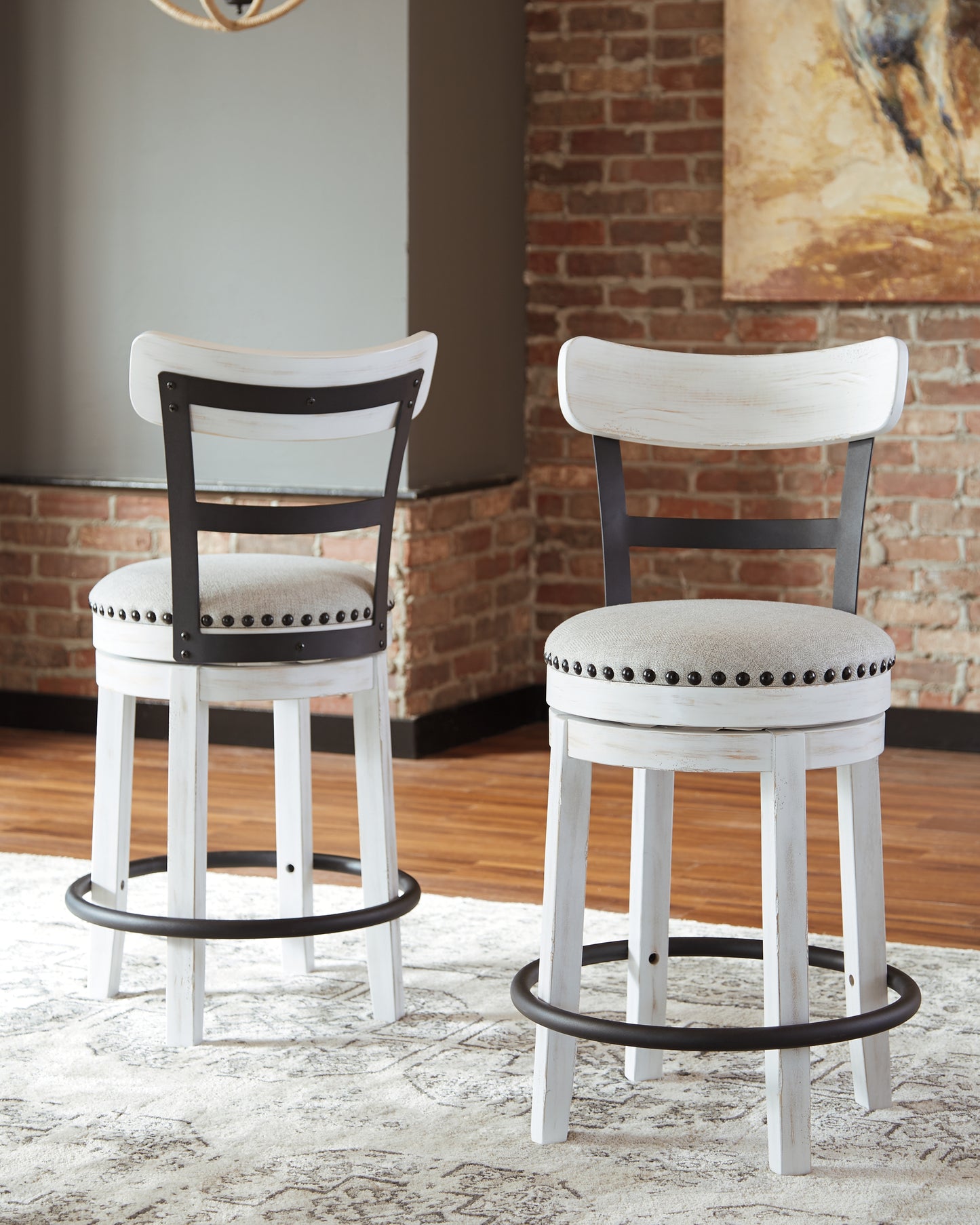 Haines Furniture Outlet - Ashley Furniture - Valebeck Dining Room - UPH Swivel Stool (1/CN) / Black - D546-824