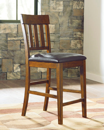Haines Furniture Outlet - Ashley Furniture - Ralene Dining Room - Counter Height Bar Stool (Set of 2) / Medium Brown - D594-124X2
