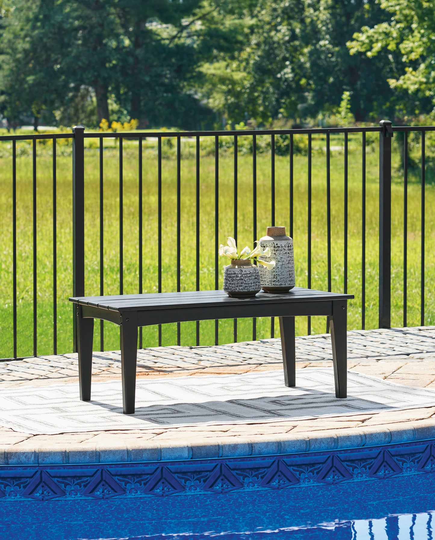 Haines Furniture Outlet - Ashley Furniture - Hyland wave Outdoor - Rectangular Cocktail Table / Black - P108-701