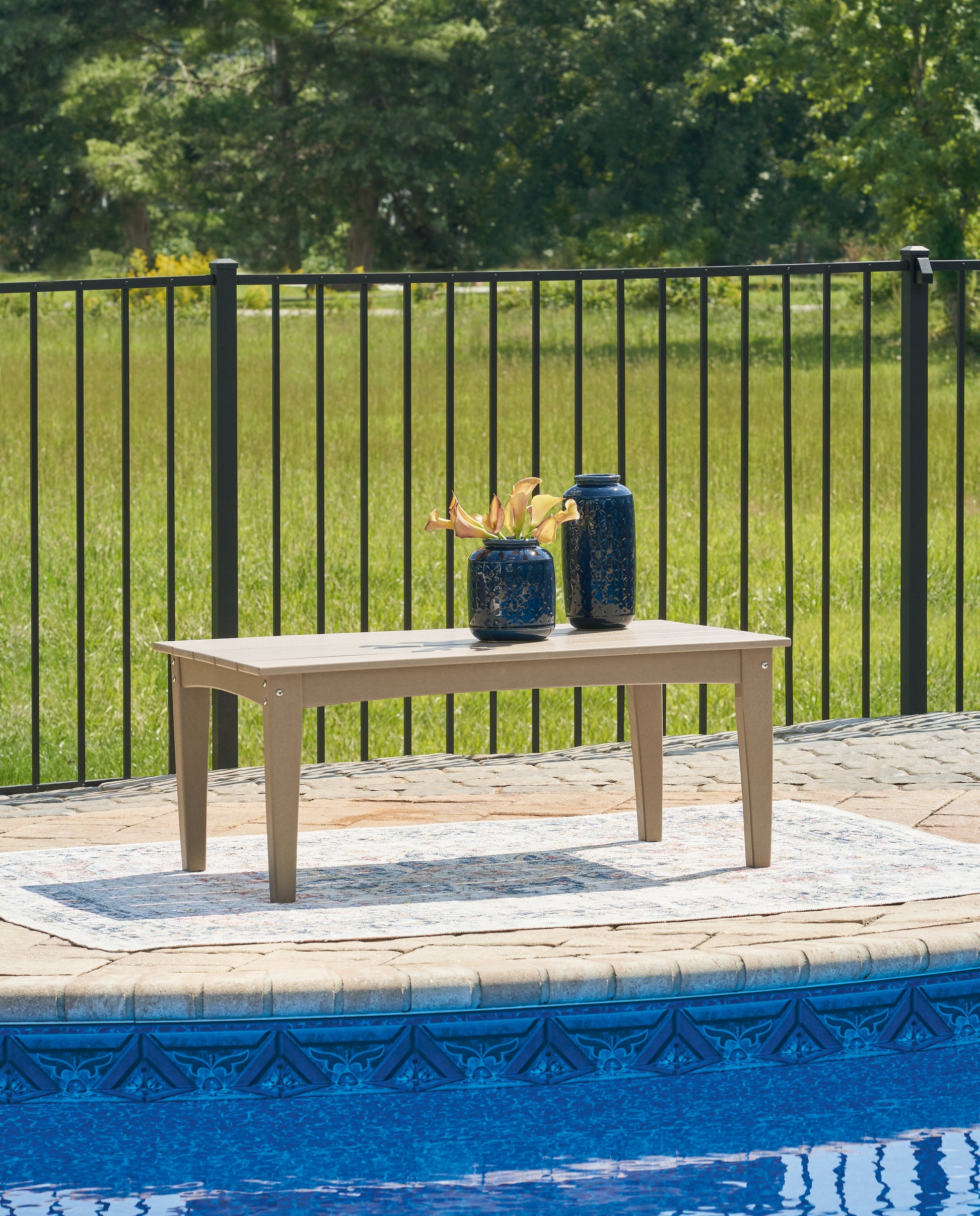 Haines Furniture Outlet - Ashley Furniture - Hyland wave Outdoor - Rectangular Cocktail Table / Driftwood - P114-701