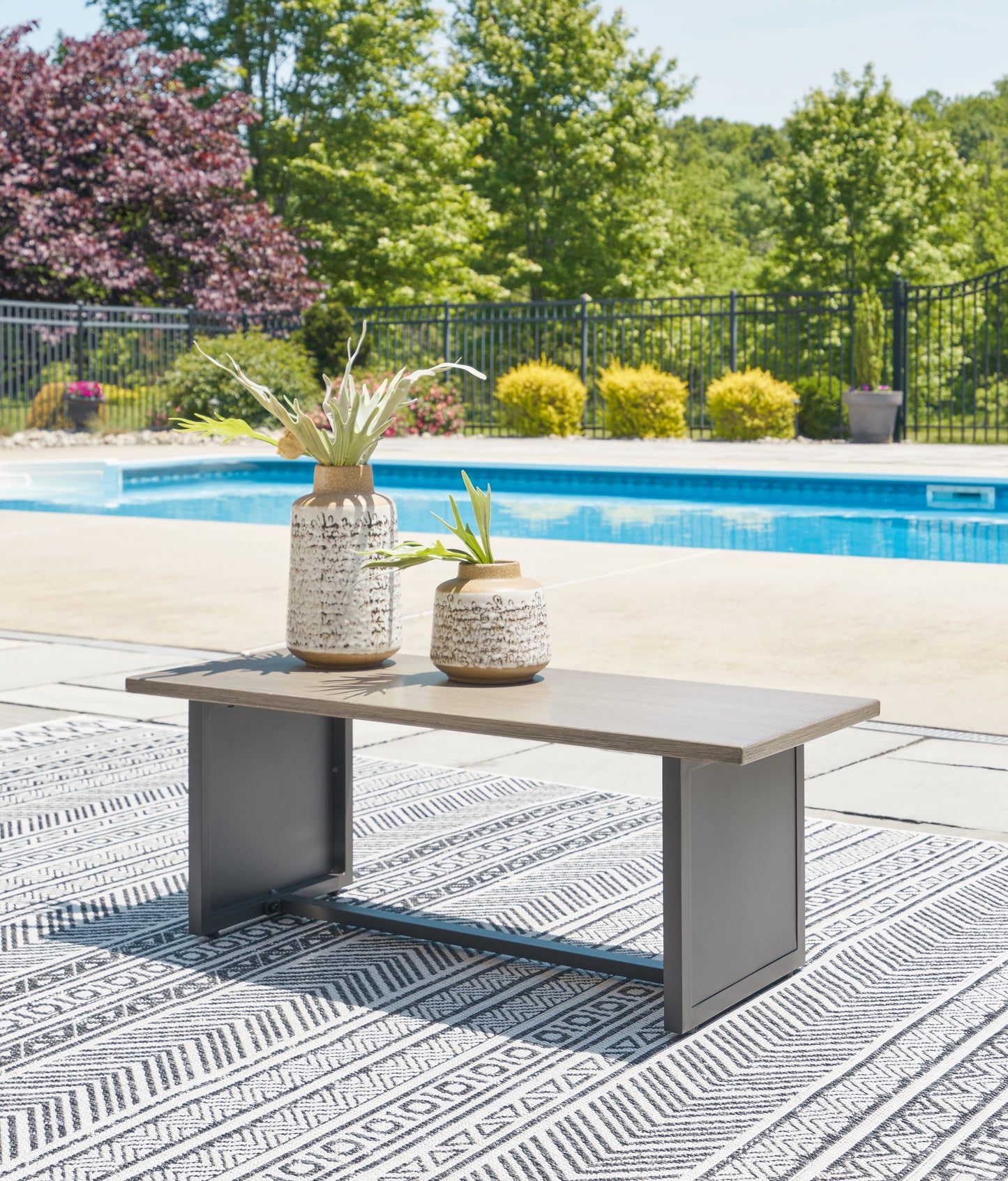 Haines Furniture Outlet - Ashley Furniture - Bree Zee Outdoor - Rectangular End Table / Brown - P160-703