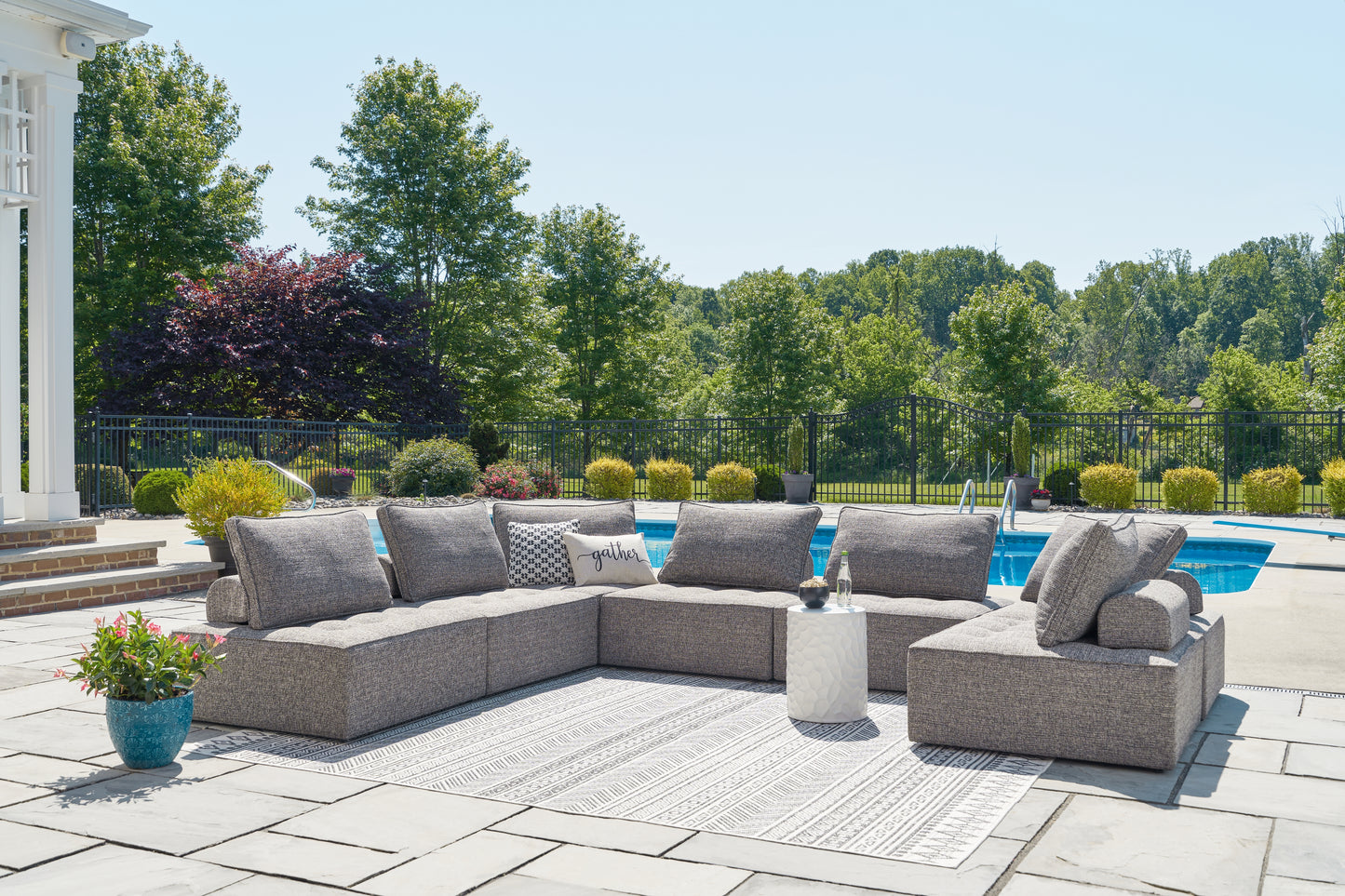 Haines Furniture Outlet - Ashley Furniture - Bree Zee Outdoor - 7-Piece Outdoor Sectional / Brown - P160P2