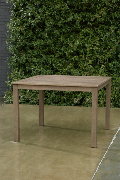 Haines Furniture Outlet - Ashley Furniture - Aria Plains Outdoor - Square Dining Table w/UMB OPT / Brown - P359-615