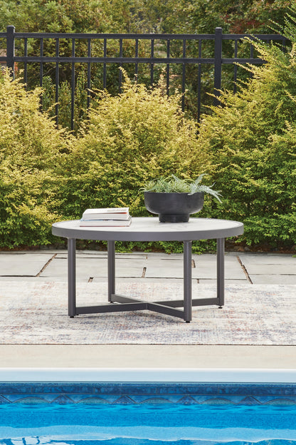 Haines Furniture Outlet - Ashley Furniture - Ocean Beach Outdoor - Round Cocktail Table / Gray - PCP510-708