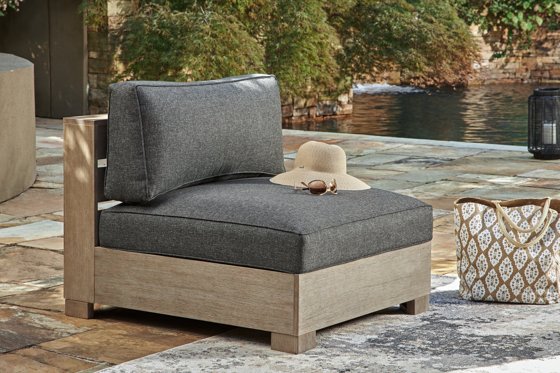 Haines Furniture Outlet - Ashley Furniture - Citrine Park Outdoor - Ottoman with Cushion / Brown/Charcoal - P660-814