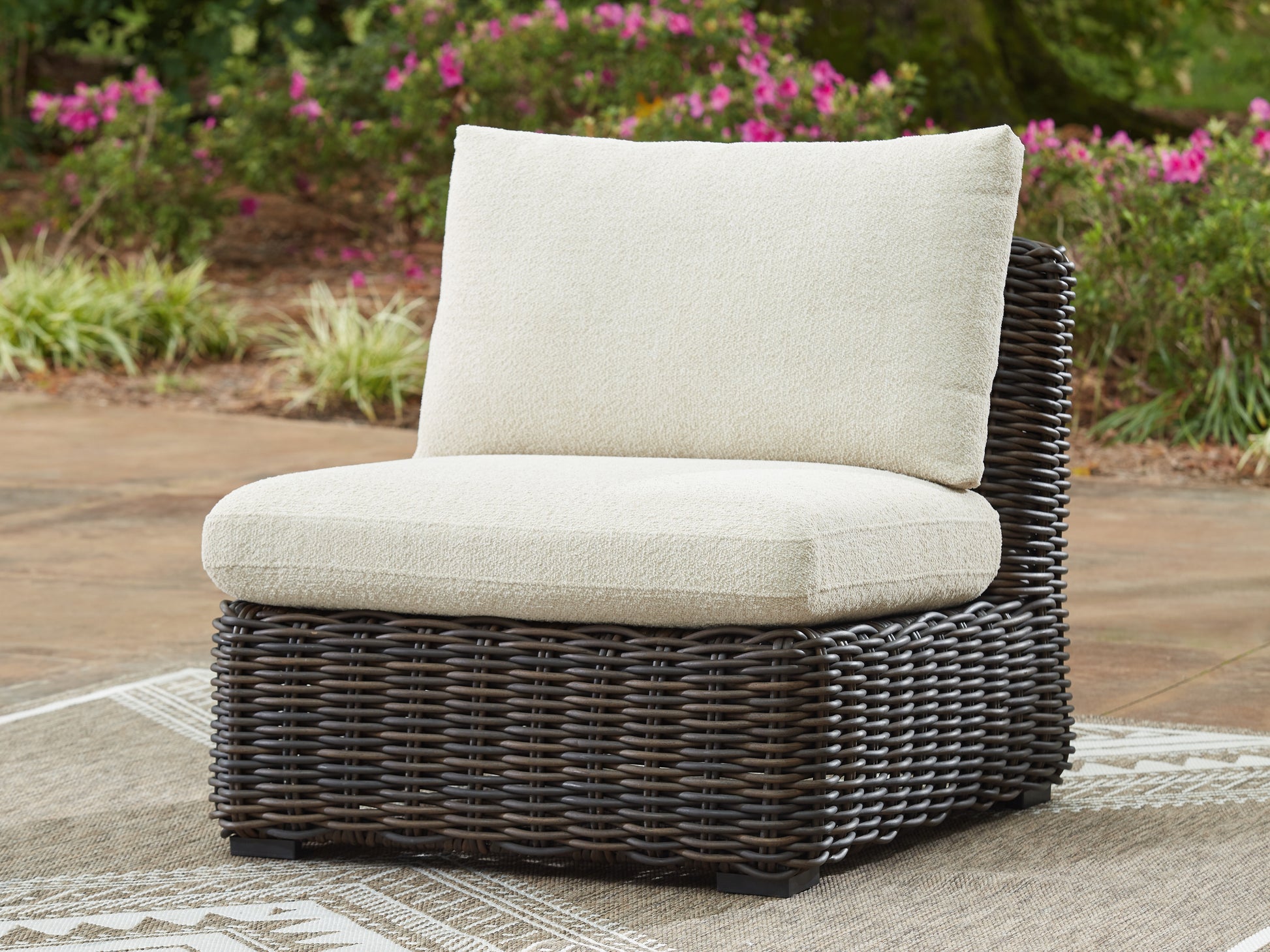Haines Furniture Outlet - Ashley Furniture - Kimora Outdoor - Armless Chair w/Cushion / Beige/Dark Brown - P711-846