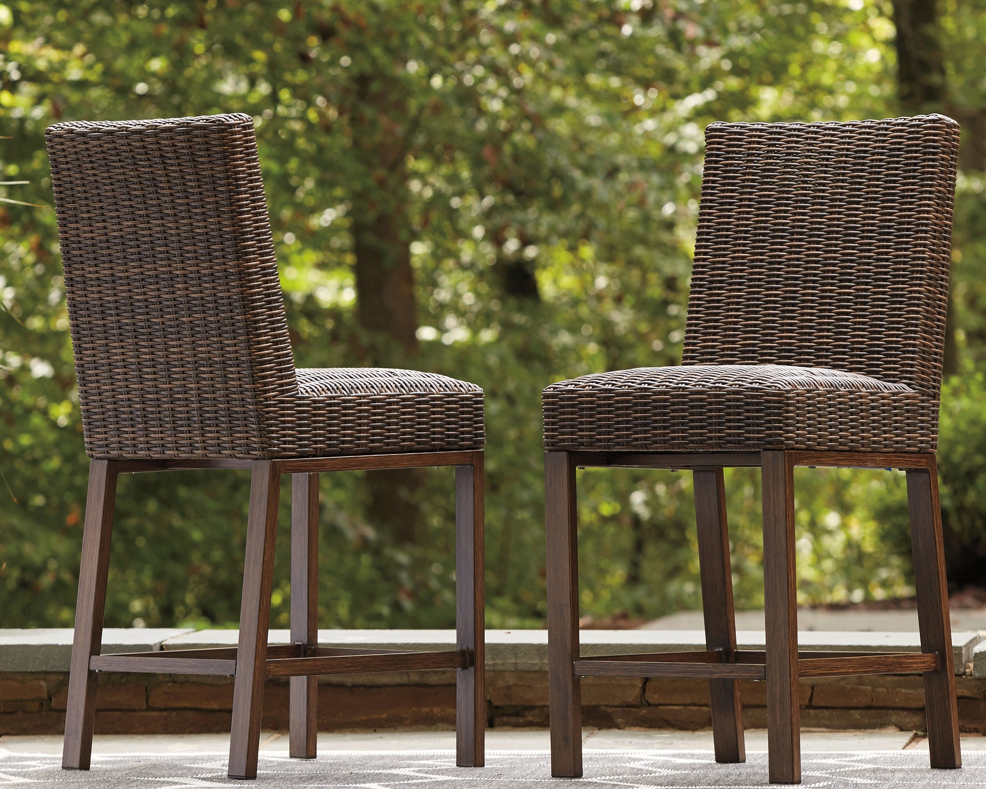 Haines Furniture Outlet - Ashley Furniture - Paradise Trail Outdoor - Barstool (Set of 2) / Medium Brown - P750-130