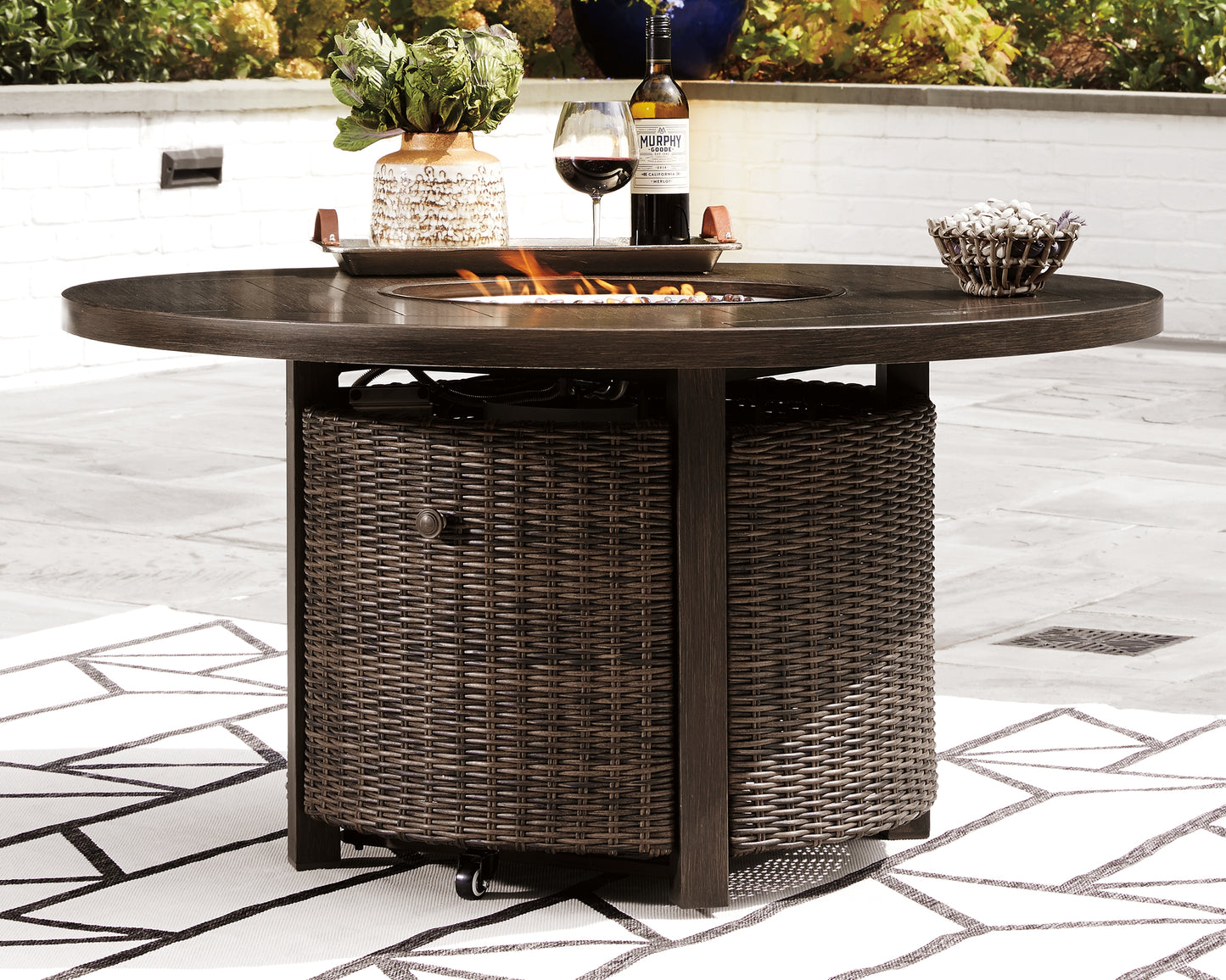 Haines Furniture Outlet - Ashley Furniture - Paradise Trail Outdoor - Round Fire Pit Table / Medium Brown - P750-776