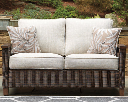 Haines Furniture Outlet - Ashley Furniture - Paradise Trail Outdoor - Loveseat w/Cushion / Medium Brown - P750-835