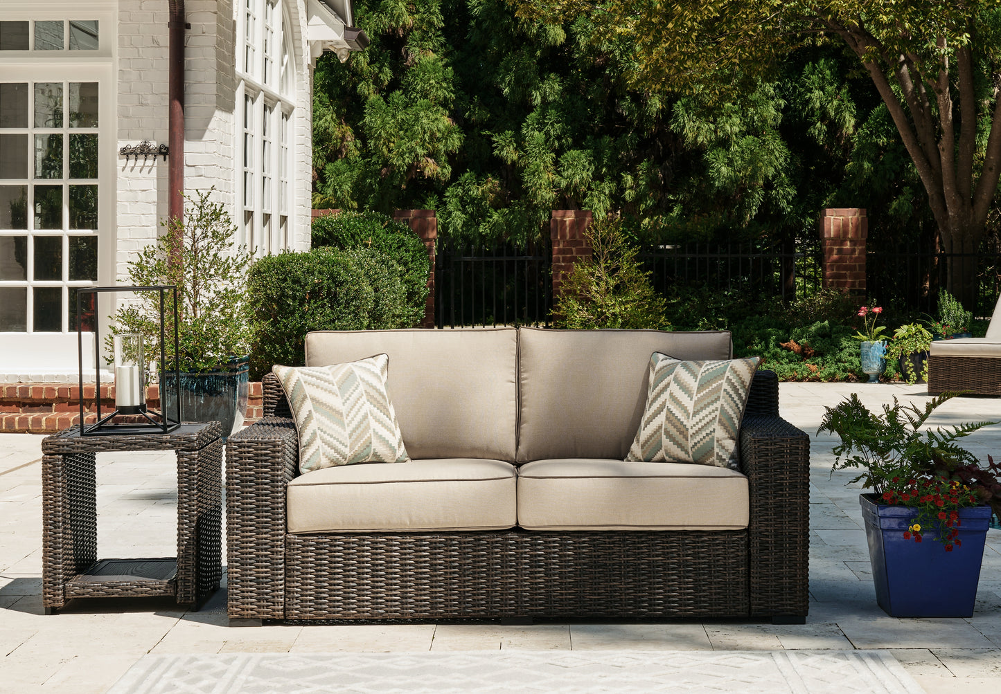 Haines Furniture Outlet - Ashley Furniture - Coastline Bay Outdoor - Loveseat w/Cushion / Brown - P784-835