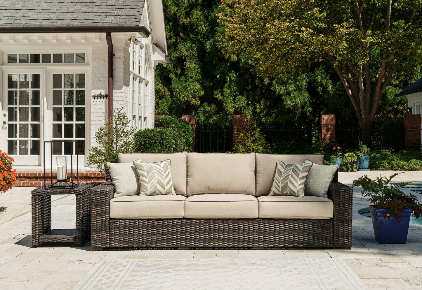 Haines Furniture Outlet - Ashley Furniture - Coastline Bay Outdoor - Sofa with Cushion / Brown - P784-838