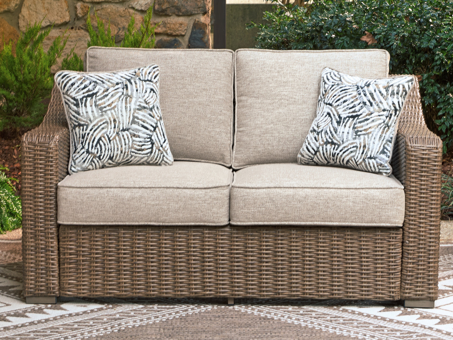 Haines Furniture Outlet - Ashley Furniture - Laguna Heights Outdoor - Loveseat w/Cushion / Beige - PCP790-835