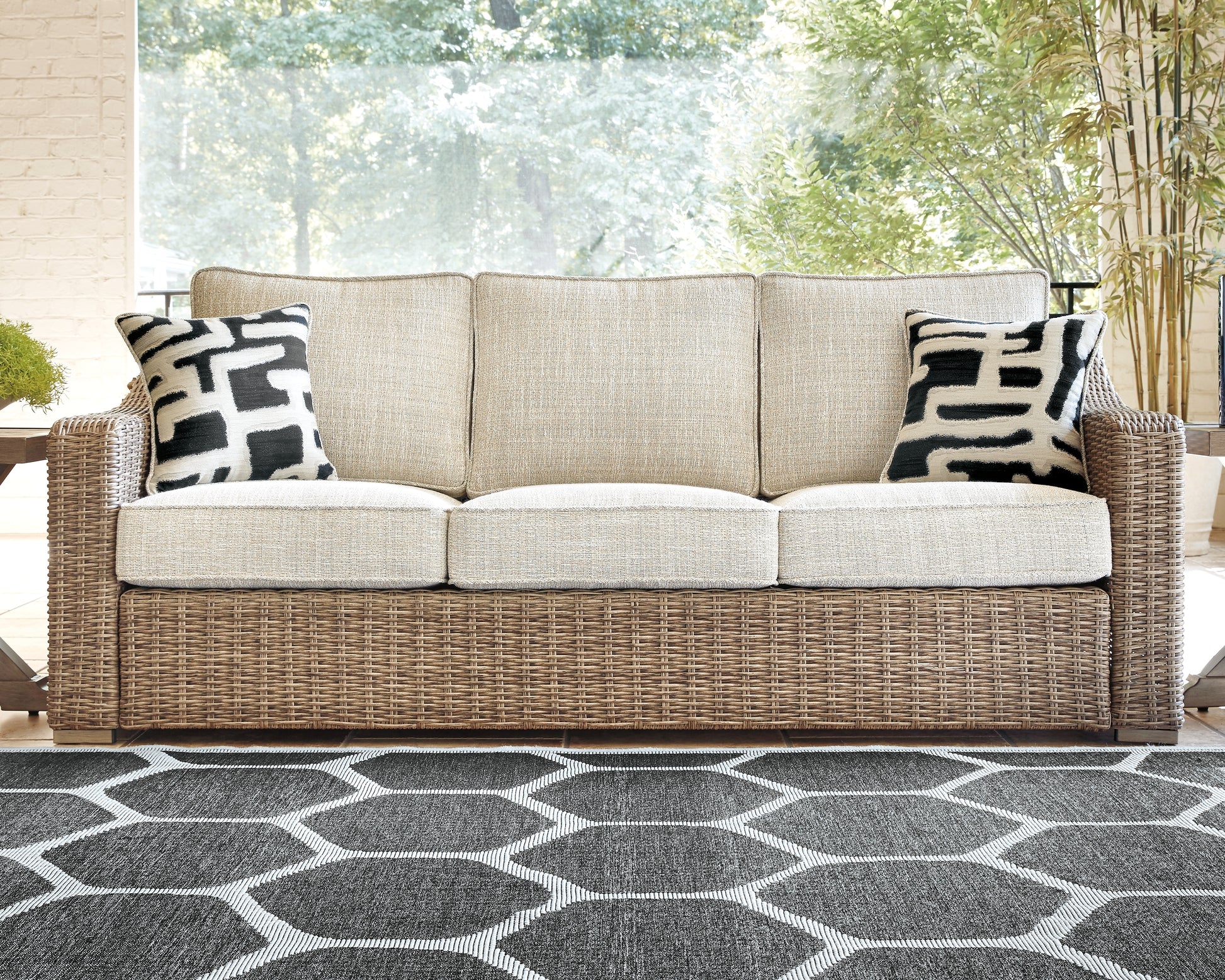 Haines Furniture Outlet - Ashley Furniture - Beachcroft Outdoor - Sofa with Cushion / Beige - P791-838