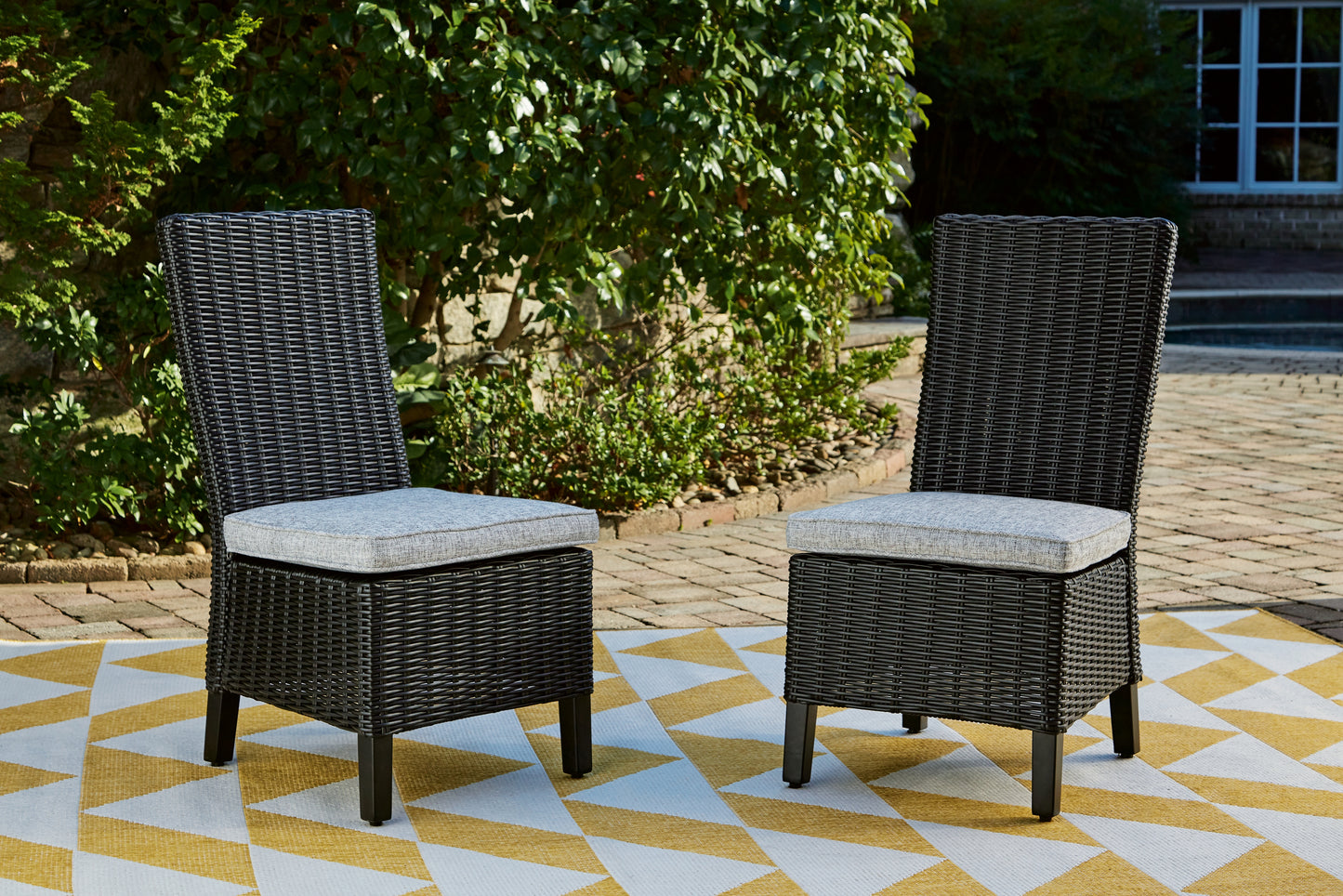 Haines Furniture Outlet - Ashley Furniture - Beachcroft Outdoor - Side Chair with Cushion (Set of 2) / Black/Light Gray - P792-601
