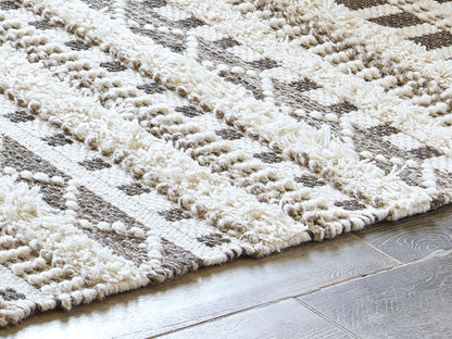 Haines Furniture Outlet - Ashley Furniture - Karalee Rug - 5' x 7' Rug / Ivory/Brown - R404442