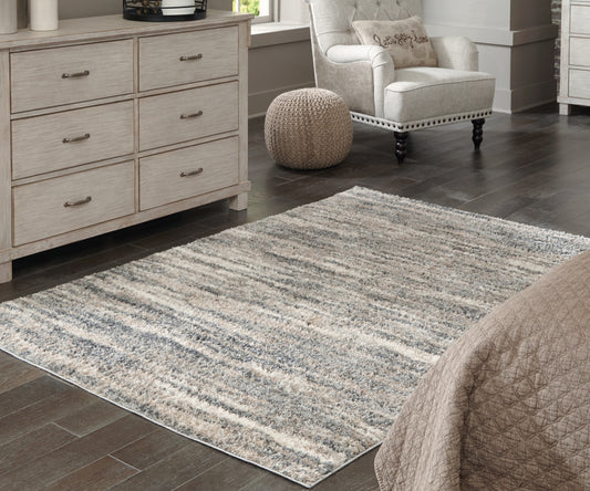 Haines Furniture Outlet - Ashley Furniture - Gizela Rug - 5'3" x 7'3" Rug / Ivory/Beige/Gray - R404862