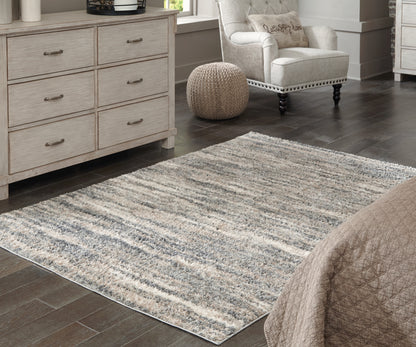 Haines Furniture Outlet - Ashley Furniture - Gizela Rug - 7'10" x 10' Rug / Ivory/Beige/Gray - R404861