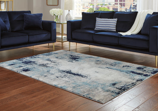 Haines Furniture Outlet - Ashley Furniture - Leonelle Rug - 5'3" x 7'3" Rug / Cream/Blue/Gray - R404872