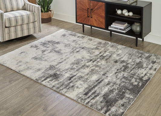 Haines Furniture Outlet - Ashley Furniture - Gerdie Rug - 5'3" x 7'3" Rug / Cream/Gray - R404992