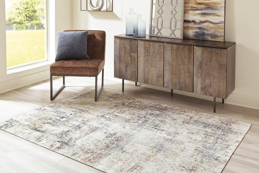 Haines Furniture Outlet - Ashley Furniture - Jerelyn Rug - 7'10" x 10' Rug / Multi - R405041