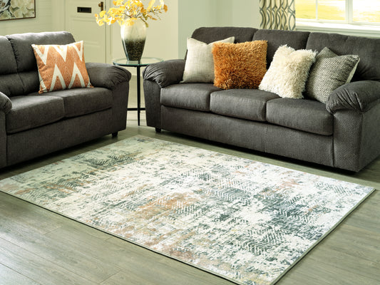 Haines Furniture Outlet - Ashley Furniture - Redlings Rug - 7'5" x 9'6" Rug / Multi - R405451