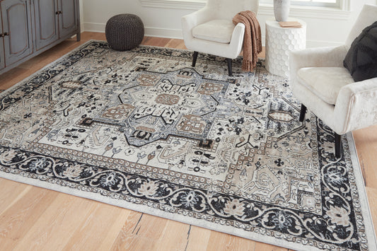 Haines Furniture Outlet - Ashley Furniture - Gregmoore Rug - 7'9" x 9'11" Washable Rug / Multi - R405821