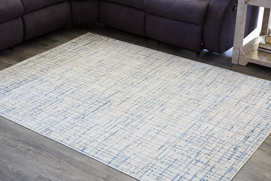 Haines Furniture Outlet - Ashley Furniture - Beckfille Rug - 5' x 7' Rug / Blue/Gray/Cream - R405962