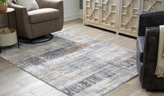 Haines Furniture Outlet - Ashley Furniture - Rhettner Rug - 5'3" x 7'3" Rug / Multi - R406072