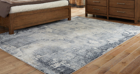 Haines Furniture Outlet - Ashley Furniture - Langrich Rug - 5'3" x 7'3" Rug / Blue/Gray/Cream - R406132