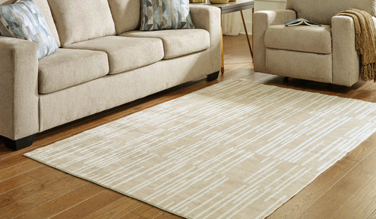 Haines Furniture Outlet - Ashley Furniture - Ardenville Rug - 5' x 7'1" Washable Rug / Tan/Cream - R406212