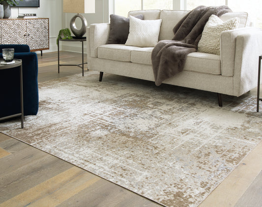 Haines Furniture Outlet - Ashley Furniture - Grifflain Rug - 5'1" x 7' Washable Rug / Tan/Brown/Gray - R406232