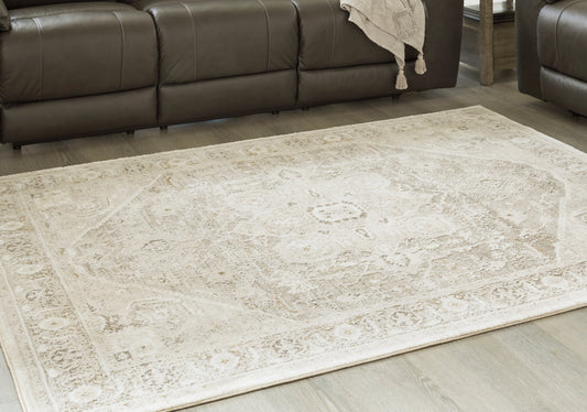 Haines Furniture Outlet - Ashley Furniture - Gatwell Rug - 5' x 7' Rug / Ivory/Gray/Tan - R406512