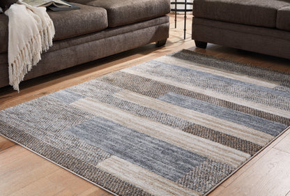 Haines Furniture Outlet - Ashley Furniture - Sethburn Rug - 8' x 10' Rug / Cream/Brown/Gray - R406591