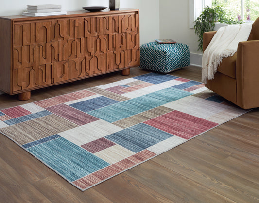Haines Furniture Outlet - Ashley Furniture - Numore Rug - 8' x 9'11" Washable Rug / Multi - R406661