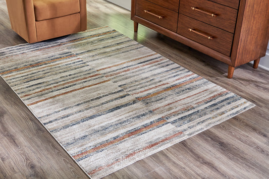 Haines Furniture Outlet - Ashley Furniture - Kemart Rug - 5' x 7' Rug / Multi - R406682