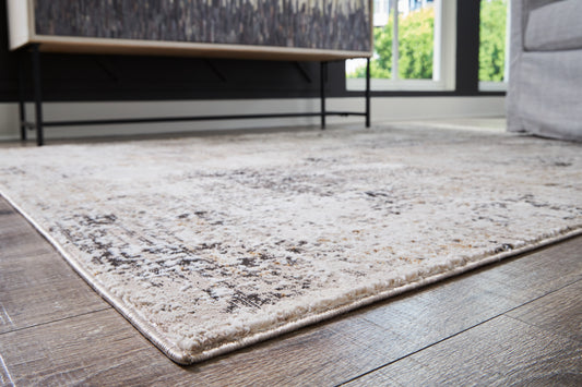 Haines Furniture Outlet - Ashley Furniture - Elaning Rug - 5' x 7' Rug / Black/Gray/Cream - R406702