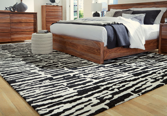 Haines Furniture Outlet - Ashley Furniture - Bramshaw Rug - 10' x 14' Rug / Black/Ivory - R406760