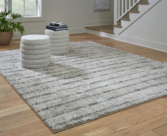 Haines Furniture Outlet - Ashley Furniture - Laddway Rug - 8' x 10' Rug / Cream/Green - R406881