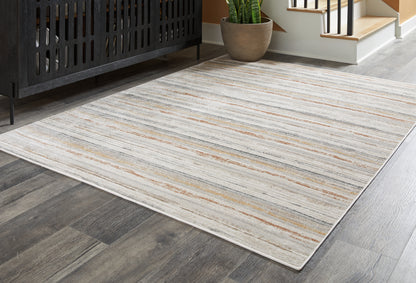 Haines Furniture Outlet - Ashley Furniture - Artney Rug - 5' x 7' Rug / Multi - R407022