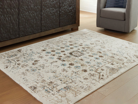 Haines Furniture Outlet - Ashley Furniture - Jossler Rug - 8' x 10' Rug / Ivory/Brown/Teal - R407071