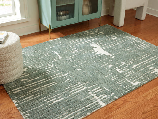 Haines Furniture Outlet - Ashley Furniture - Cayworth Rug - 5' x 7' Rug / Teal/White - R407092