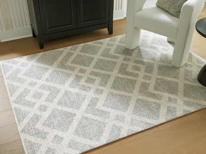Haines Furniture Outlet - Ashley Furniture - Unawick Rug - Medium Rug / Gray/Ivory - R407332
