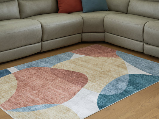 Haines Furniture Outlet - Ashley Furniture - Chanleigh Rug - Washable 5' x 7' Area Rug / Multi - R407372