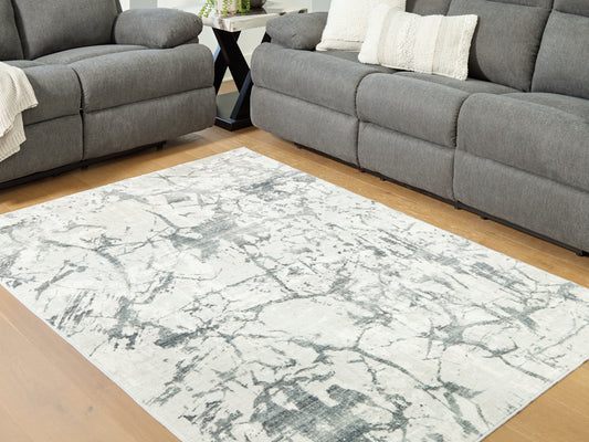 Haines Furniture Outlet - Ashley Furniture - Tobinbury Rug - Washable 5' x 7' Area Rug / Gray - R407422