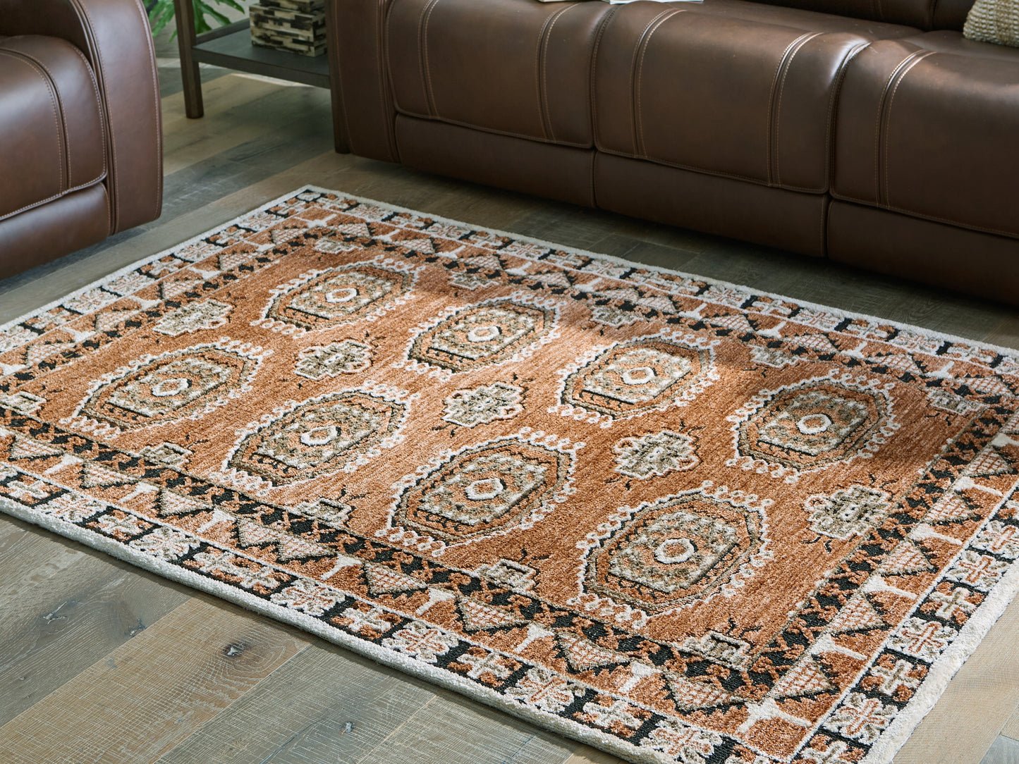 Haines Furniture Outlet - Ashley Furniture - Qaabiz Rug - 5' x 7' Area Rug / Sienna/Ivory/Black - R407522
