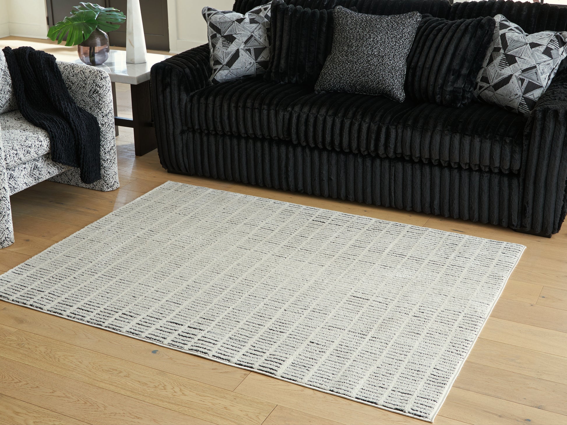Haines Furniture Outlet - Ashley Furniture - Turinwith Rug - 7'10" x 9'10" Area Rug / Ivory/Black - R407551