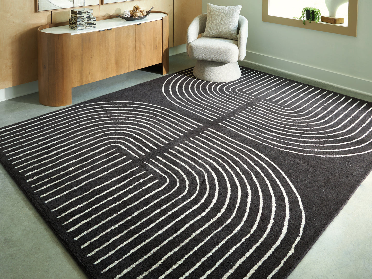 Haines Furniture Outlet - Ashley Furniture - Eldonmore Rug - 7'8" x 10' Area Rug / Black/Ivory - R407571