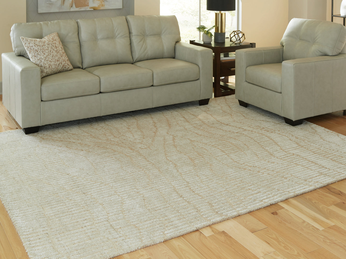 Haines Furniture Outlet - Ashley Furniture - Jaseena Rug - 7'8" x 10' Area Rug / Beige/Tan - R407721