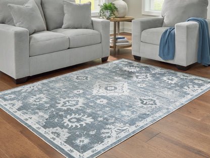 Haines Furniture Outlet - Ashley Furniture - Avanworths Rug - Washable 5'3" x 7' Area Rug / Blue/Gray/Ivory - R407792