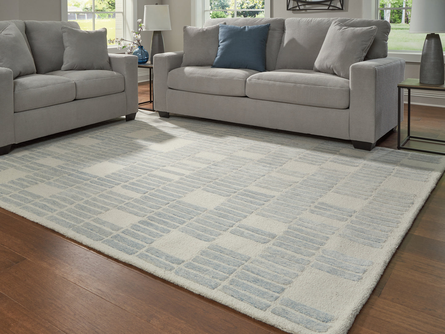 Haines Furniture Outlet - Ashley Furniture - Dylanton Rug - 5' x 7' Area Rug / Ivory/Blue - R407812